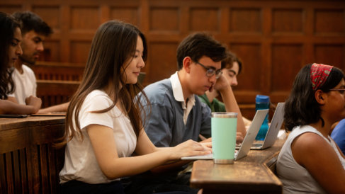 University of Cambridge students listening a lecture in the Student Services Centre old lecture hall