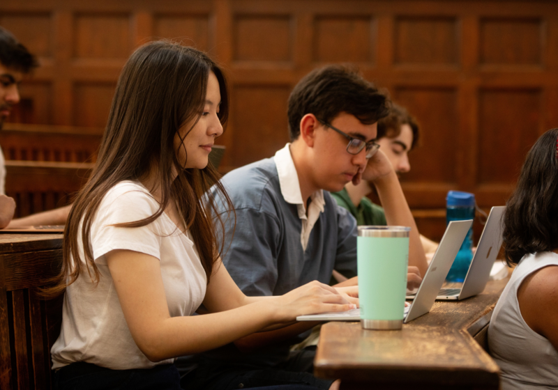 University of Cambridge students listening a lecture in the Student Services Centre old lecture hall